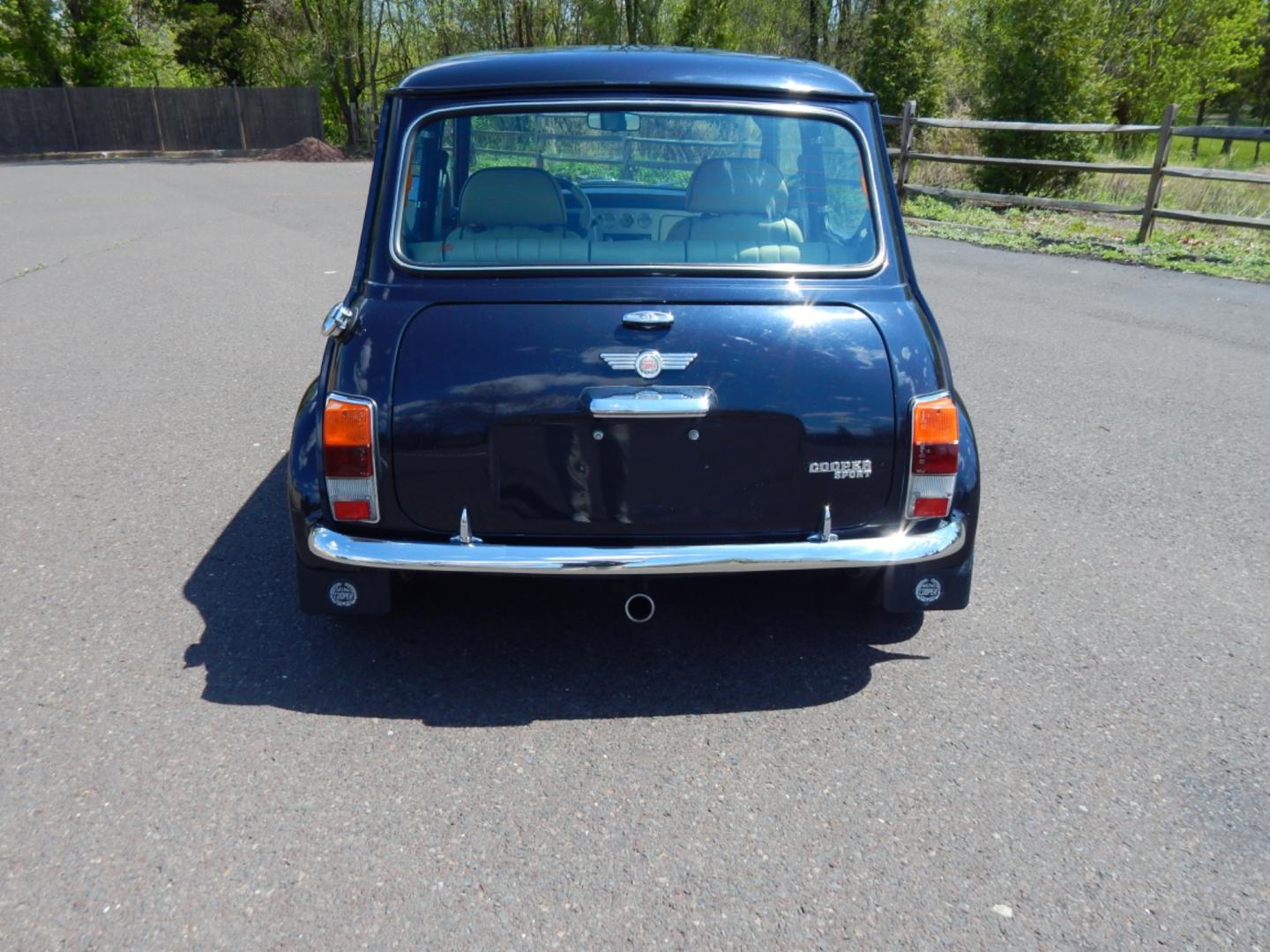 1984 Blue /Beige Leather Austin Mini Sport (A/A25751477) with an 1275cc 4 cylinder engine, Manual transmission, located at 6528 Lower York Road, New Hope, PA, 18938, (215) 862-9555, 40.358707, -74.977882 - The title to this car says she is a 1964, however in the sixties the door hinges were on the outside of the doors, also the windows in the sixties cars were sliding instead of roll up. We believe the year of this vehicle is 1984 due to the rear taillights. Here we have a beautifully restored A - Photo#8